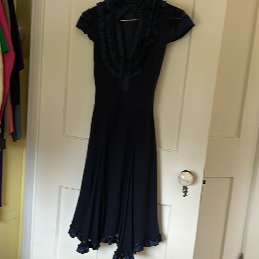 An adorable dress for any occasion. The below the knee length is charming.